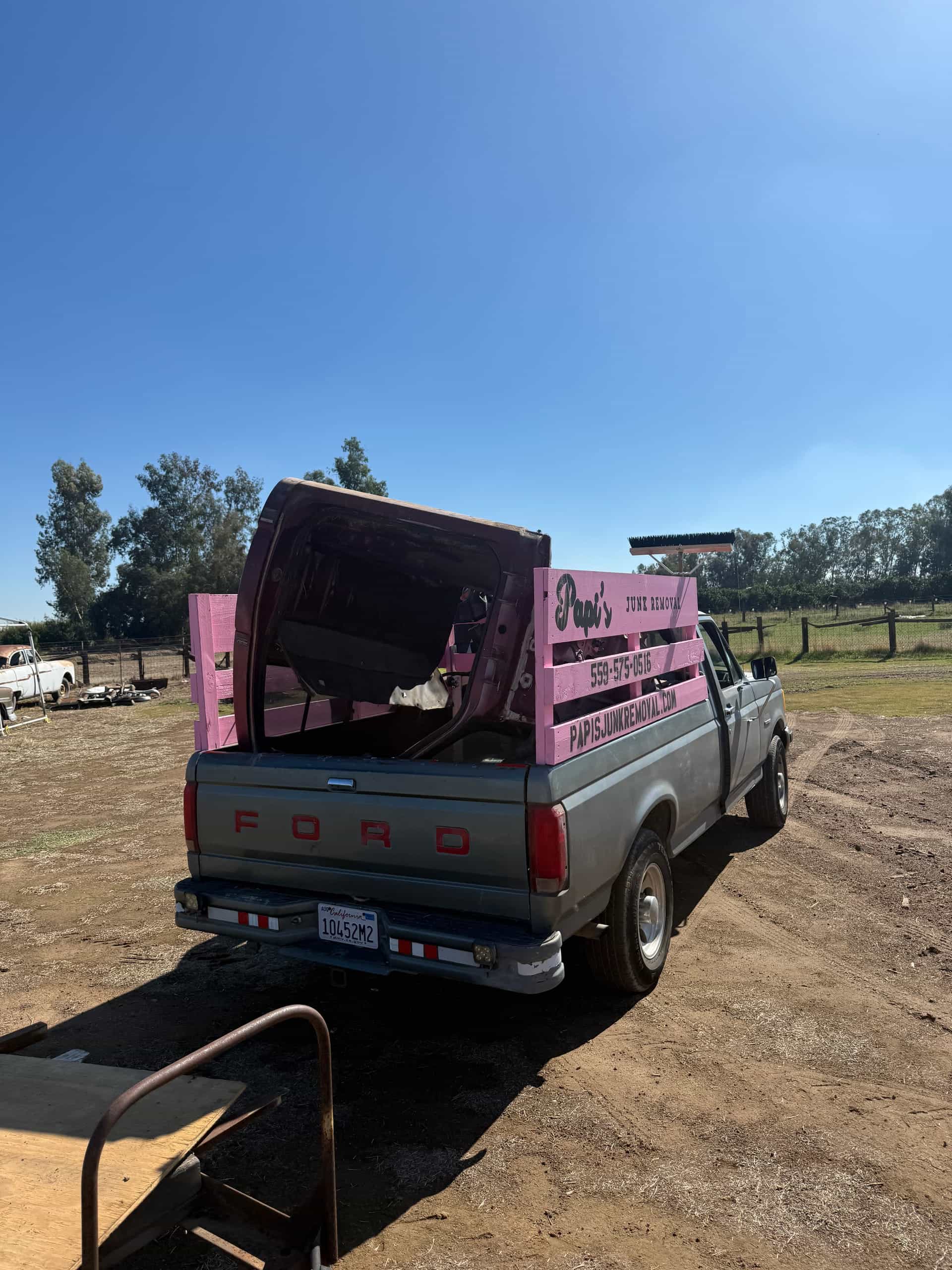 Loaded Papi's truck on a dirt lot in the farm country around Parlier