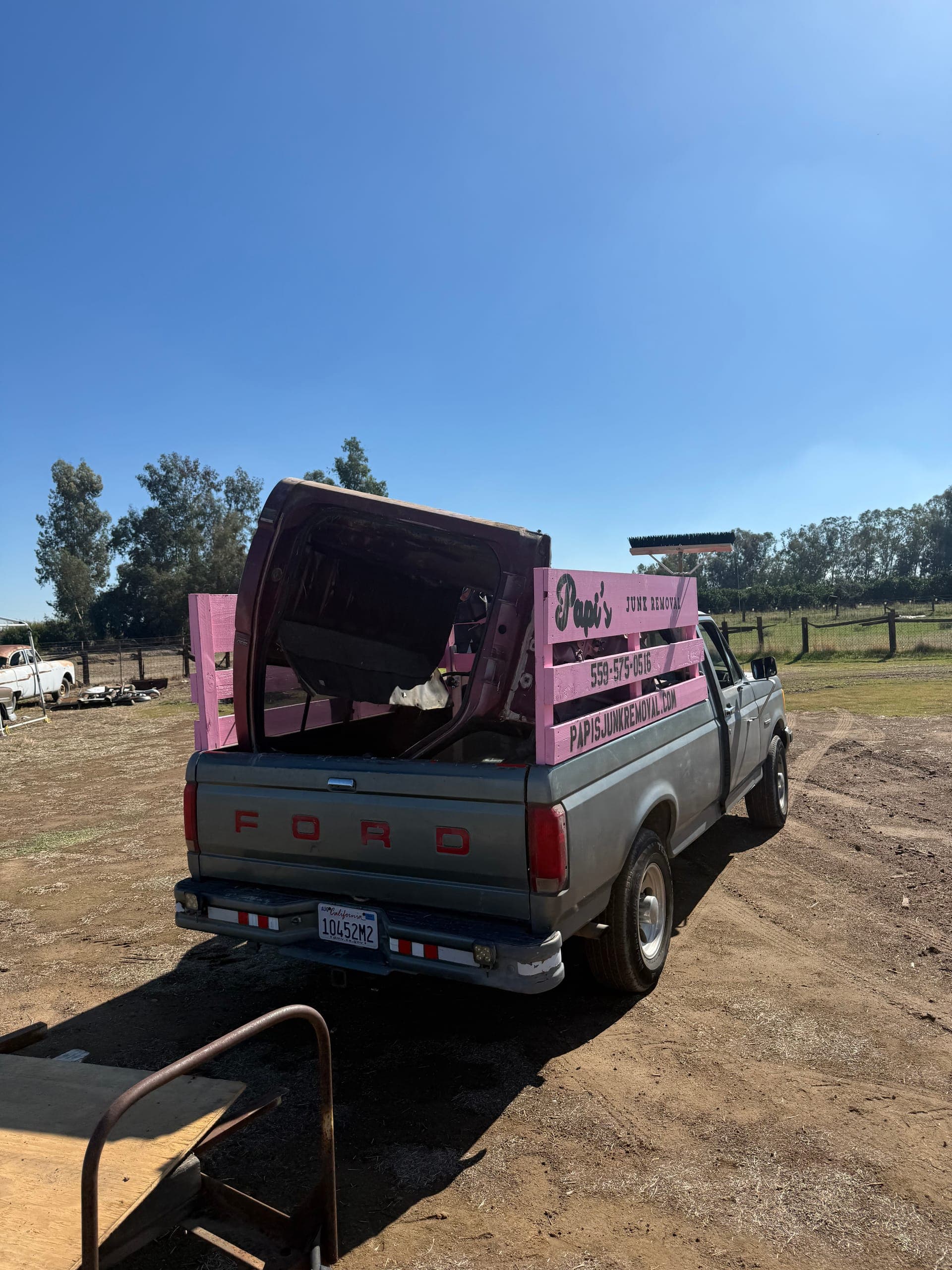 Loaded Papi's truck on a dirt lot in the Central Valley